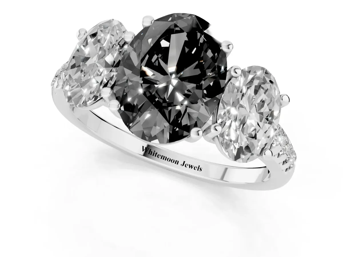 Fancy Black Three-Stone Oval Cut Diamond Ring with Round Pavé Band and Prong Setting Silver