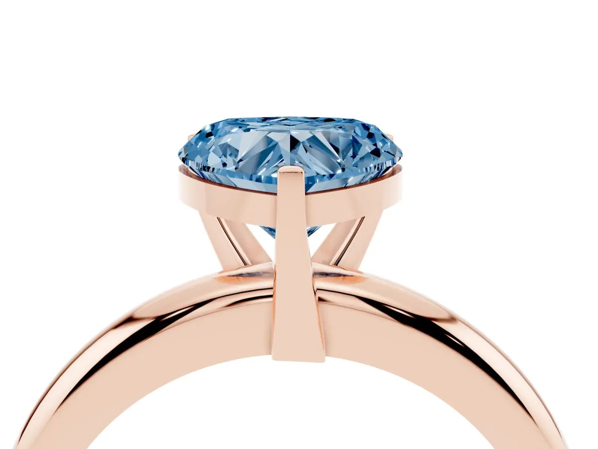Fancy Blue Heart Cut Diamond Solitaire Engagement Ring with Round Band and Four-Prong Setting Rose gold