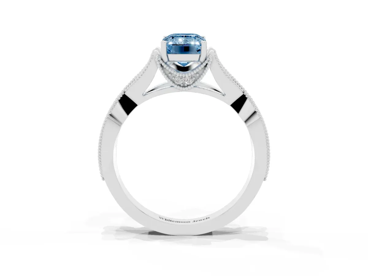 Fancy Blue Emerald Cut Cut Diamond Twisted Band with Milgrain Pave Setting and Four-Prong Setting Silver