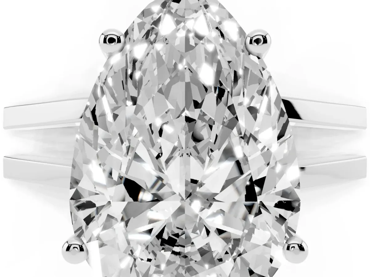 Pear Cut Cut Diamond Solitaire Engagement Ring with Tapered Plain Band and Four-Prong Setting White gold