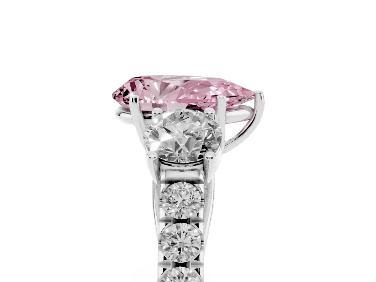 Fancy Pink Pear Cut Cut Diamond Three-Stone Ring with Round Side Stones and Pavé Band Platinum