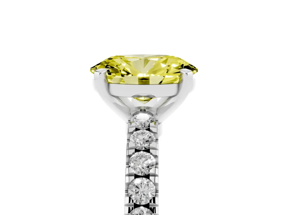 Fancy Yellow Oval Cut Solitaire Diamond with Pavé Band and Four-Prong Setting White gold
