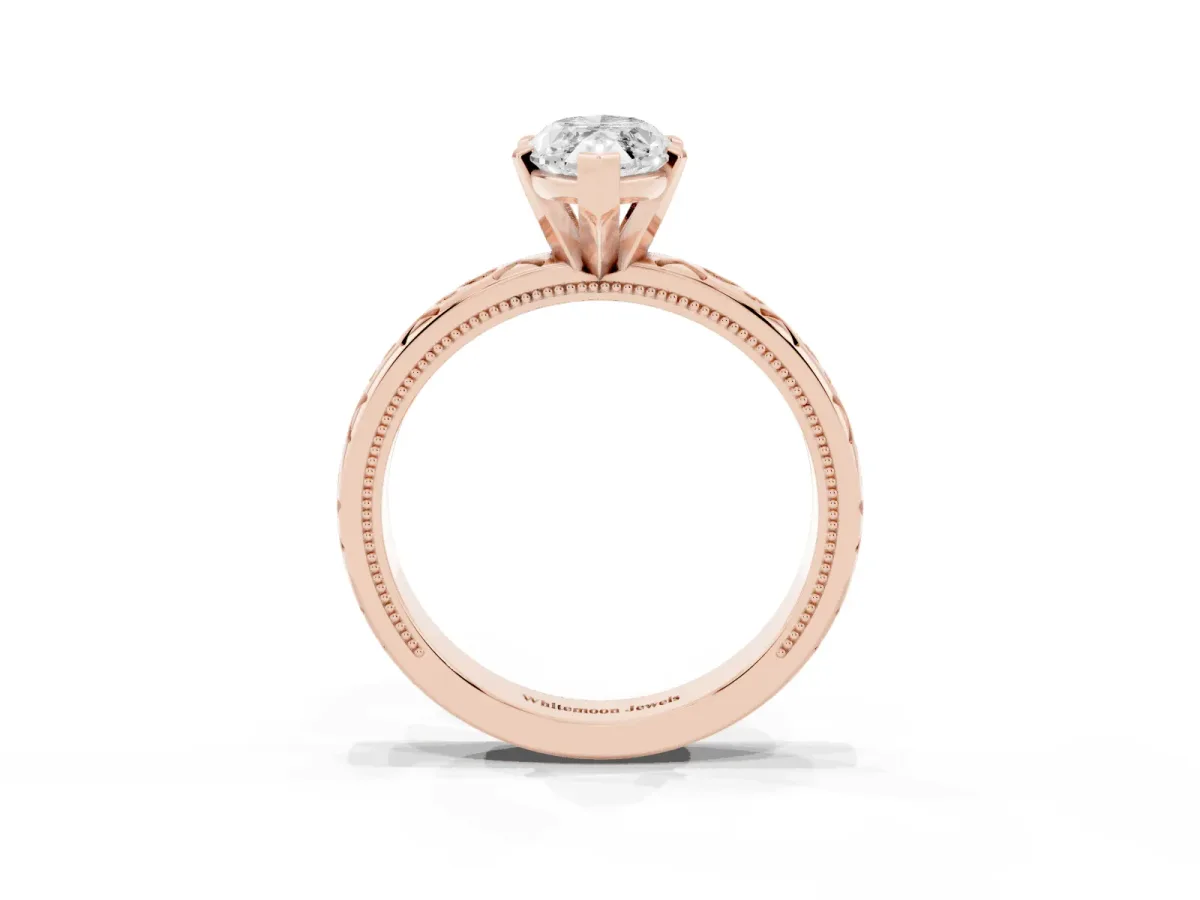 Marquise Cut Solitaire Engagement Ring with Scrollwork Band and Four-Prong Setting Rose gold