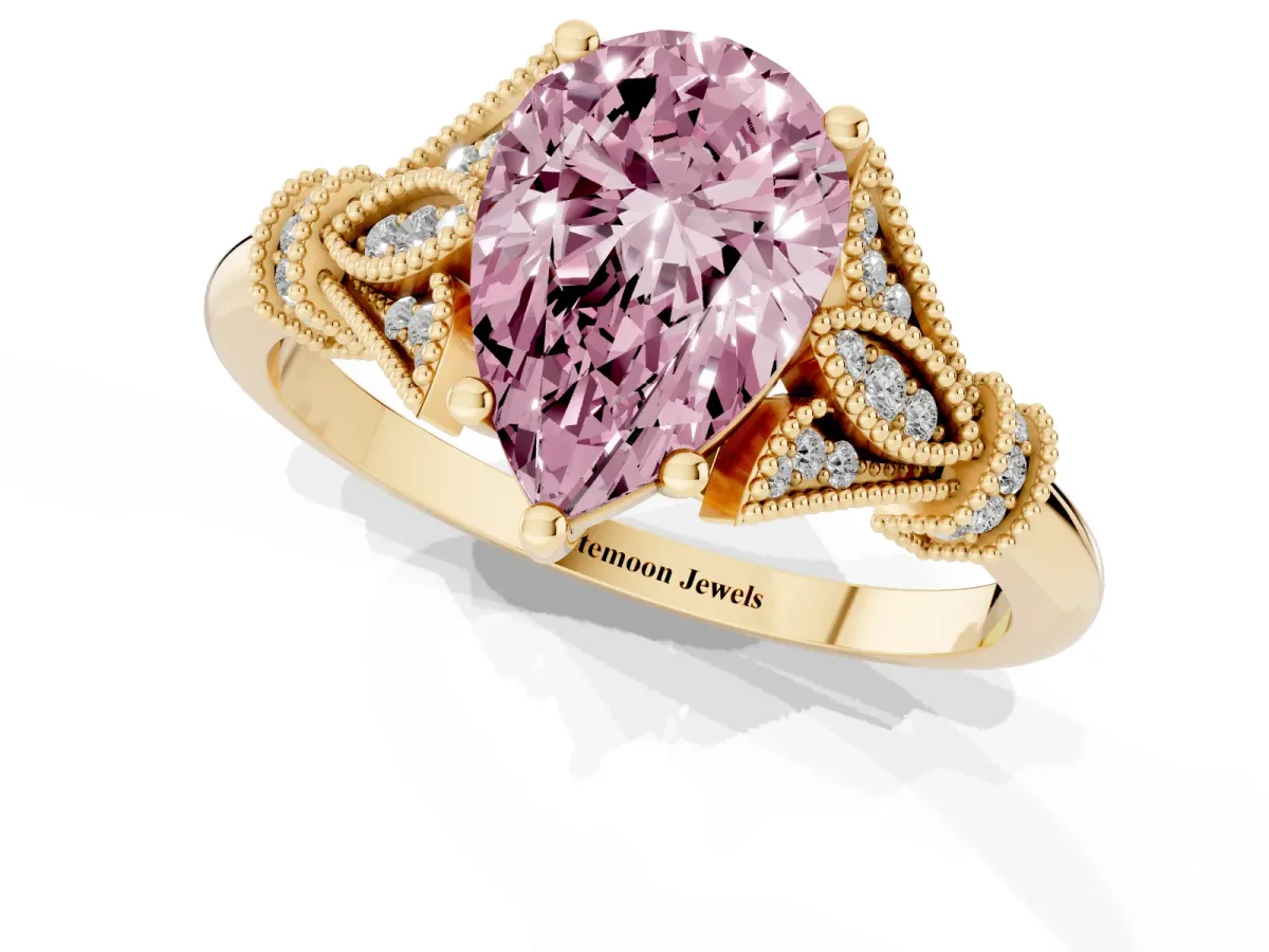 Fancy Pink Pear Cut Diamond Solitaire Ring with Floral Filigree and Pave Accents Yellow gold