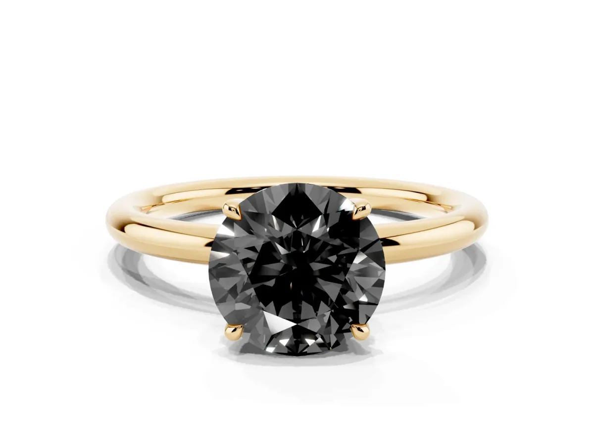 Fancy Black Round Cut Diamond Solitaire Ring with Thin Band and Four-Prong Setting Yellow gold
