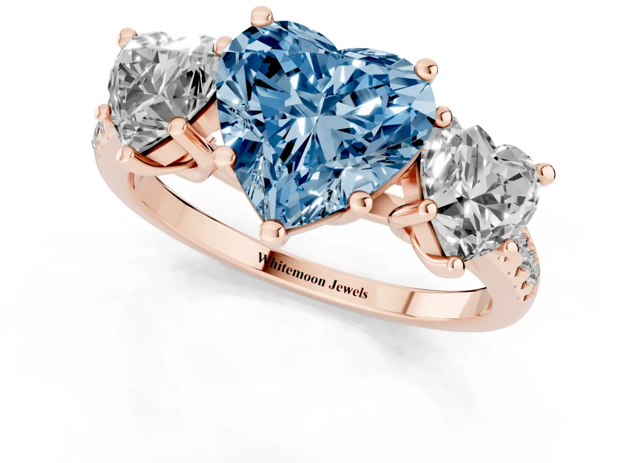Fancy Blue Three-Stone Heart Cut Diamond Ring with Round Pavé Band and Prong Setting Rose gold