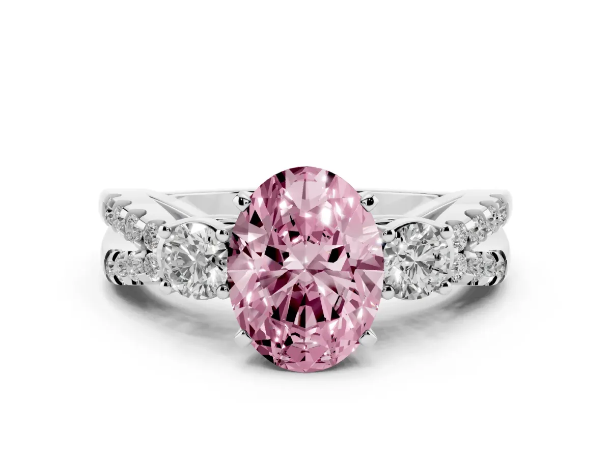 Fancy Pink Oval Cut Diamond Three-Stone Ring with Pavé Split Shank and Four-Prong Setting Silver