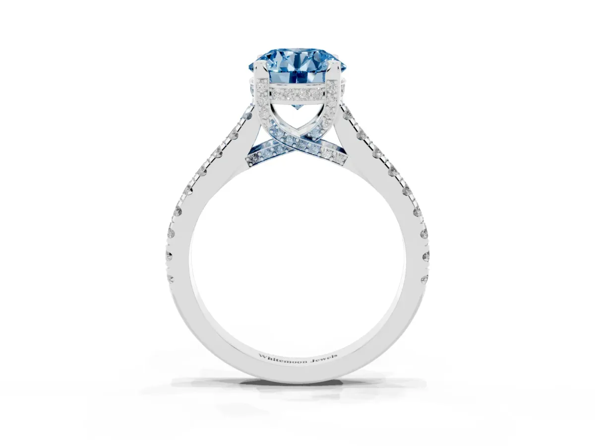 Fancy Blue Round Cut Brilliant Diamond Solitaire with Pavé Band and Four-Prong Setting Platinum