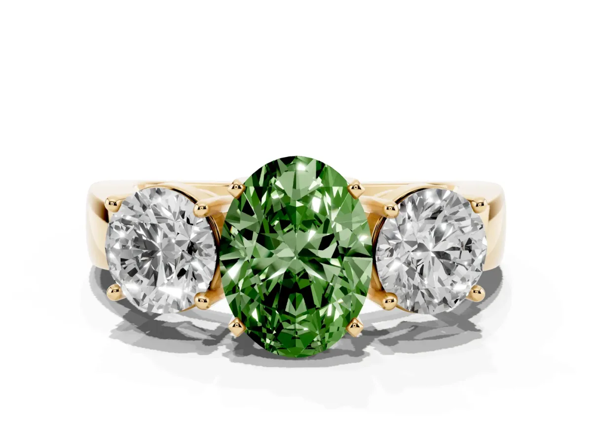 Fancy Green Three-Stone Oval Cut Diamond Ring with Round Side Stones, Classic Band, and Four-Prong Setting Yellow gold