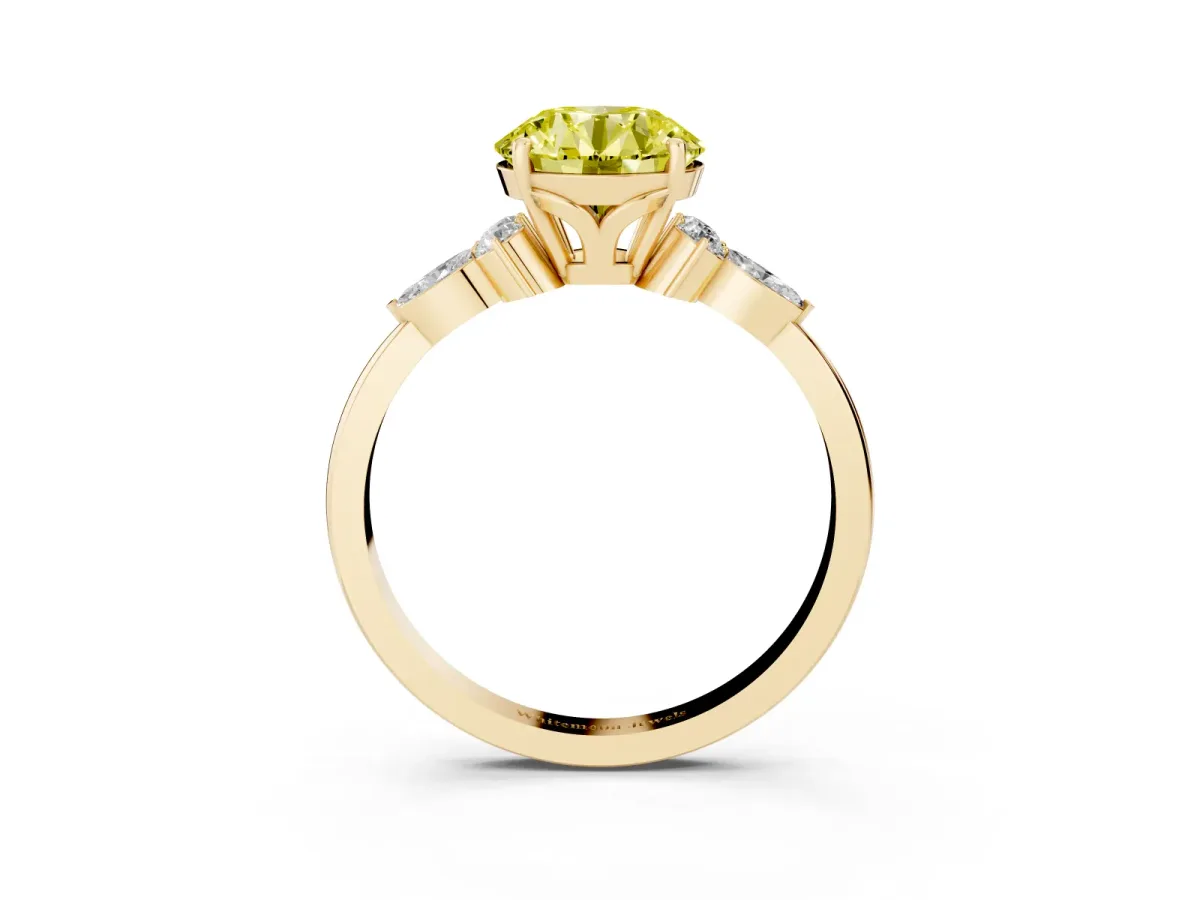Fancy Yellow Round Cut Brilliant Diamond Solitaire Ring with Pear Side Stones and Four-Prong Setting Yellow gold