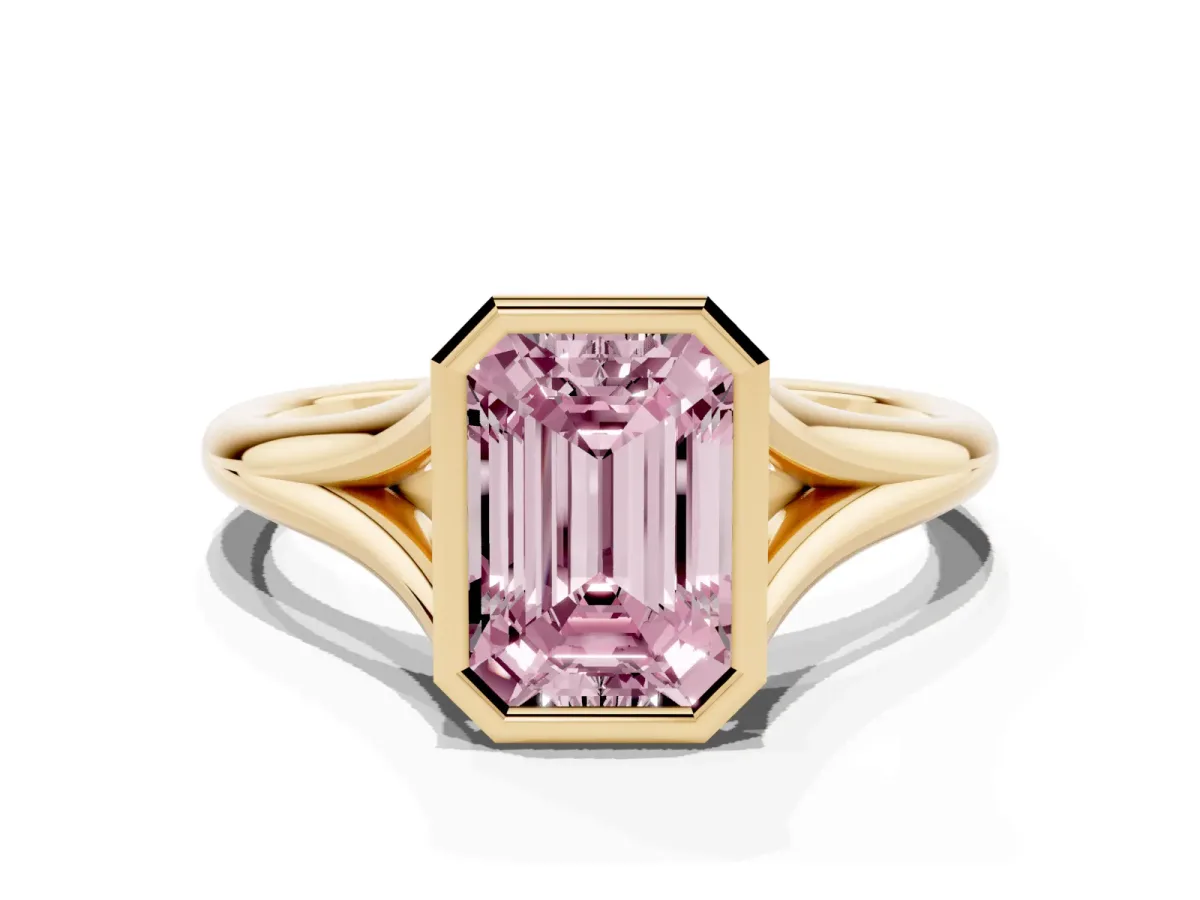 Fancy Pink Bezel Set Emerald Cut Cut Solitaire Ring with Tapered Band Yellow gold