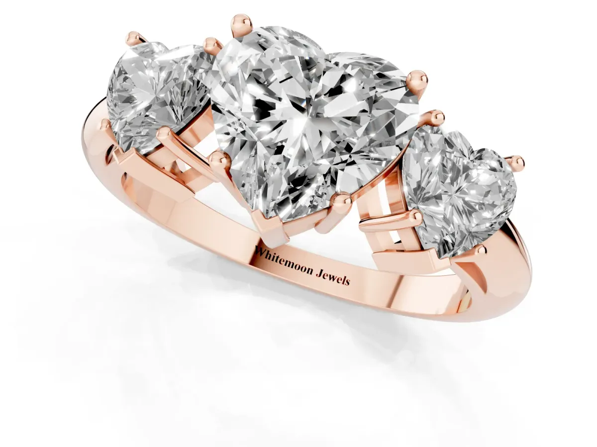 Three-Stone Heart Cut Cut Diamond Engagement Ring with Prong Setting on a White Gold Band Rose gold