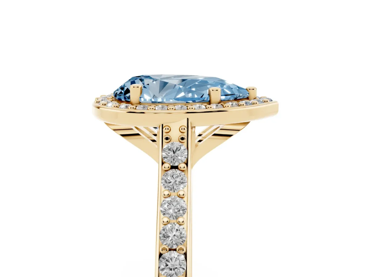 Fancy Blue Pear Cut Diamond Halo Engagement Ring with Round Pavé Shoulders and Prong Setting Yellow gold