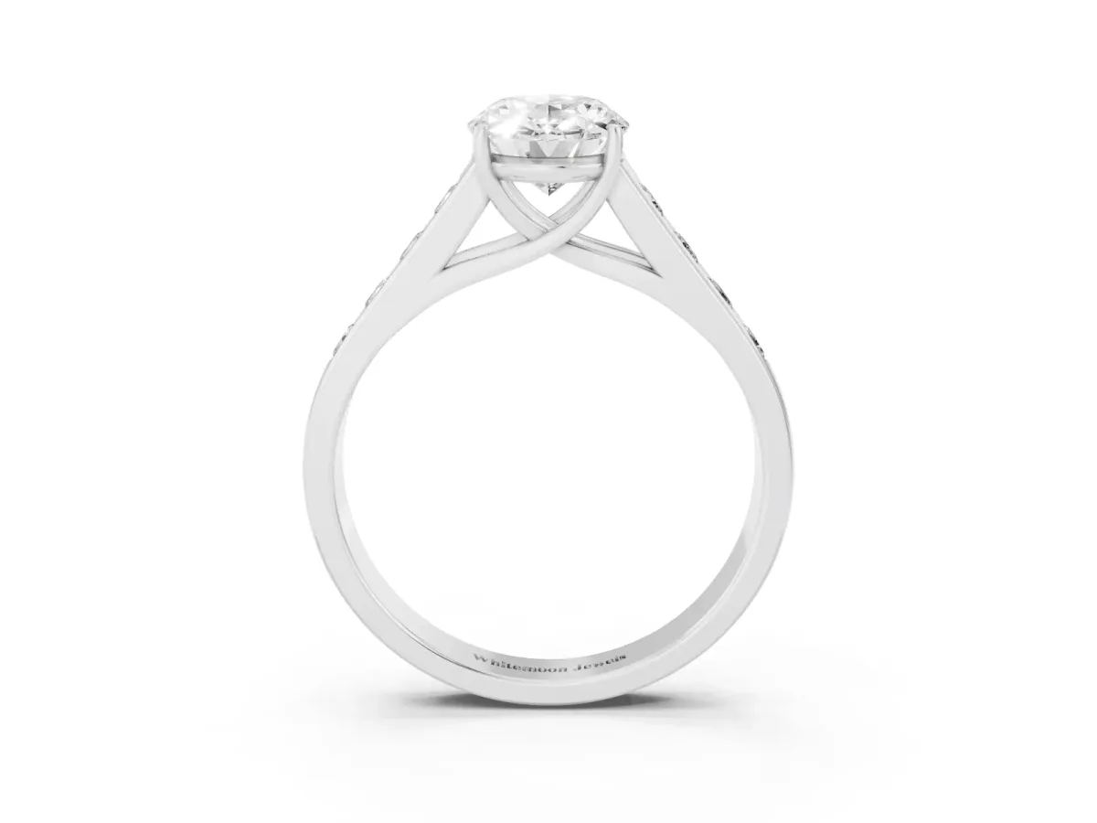Oval Cut Brilliant Channel-Set Solitaire Ring with Four-Prong Setting Silver
