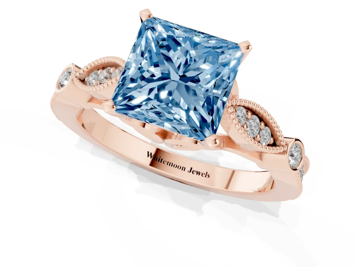 Fancy Blue Princess Cut Cut Diamond with Milgrain Marquise and Bezel Accents on a Solitaire Band with Prong Setting Rose gold