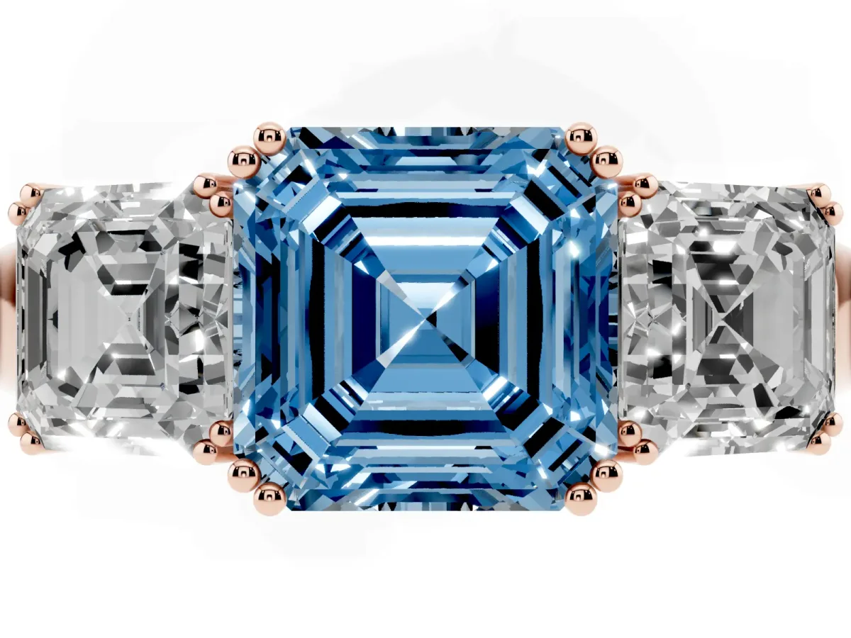 Fancy Blue Three-Stone Asscher Cut Cut Diamond Ring with Channel Set Band and Four-Prong Setting Rose gold