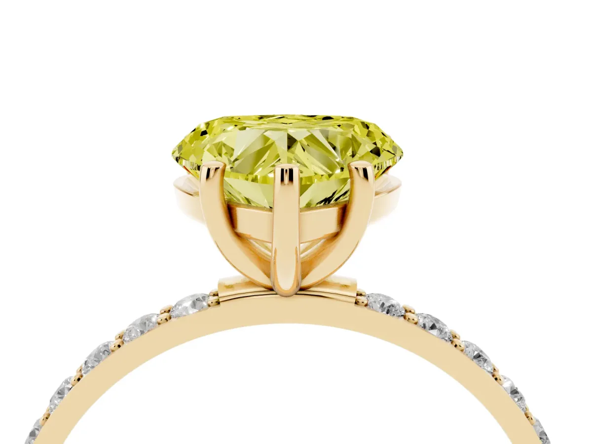 Fancy Yellow Heart Cut Diamond Solitaire Ring with Round Pavé Shoulders and Prong Setting Yellow gold