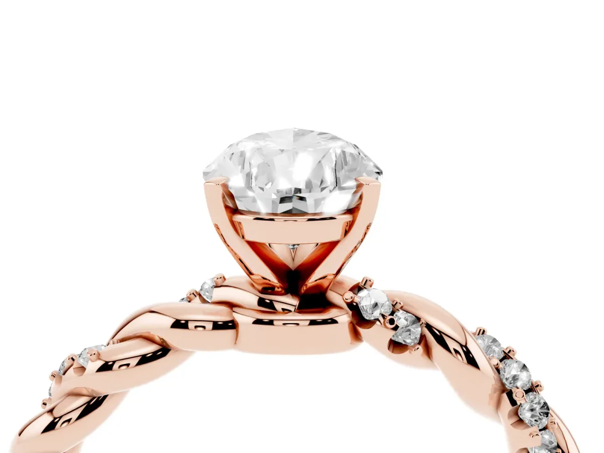 Pear Cut Diamond Solitaire Ring with Twisted Band and Pavé Accents Rose gold