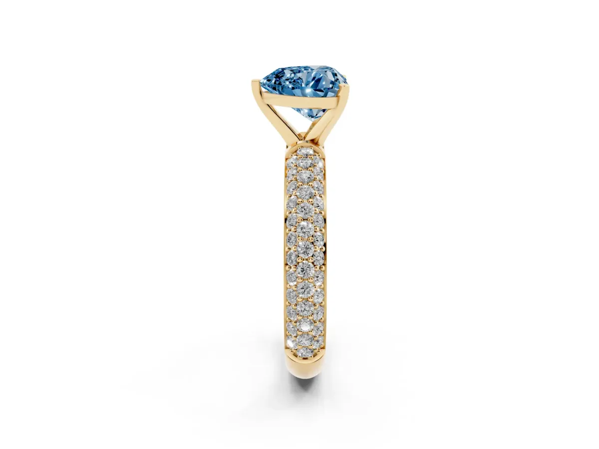 Fancy Blue Heart Cut Diamond Solitaire Ring with Prong Setting and Pavé Band Yellow gold
