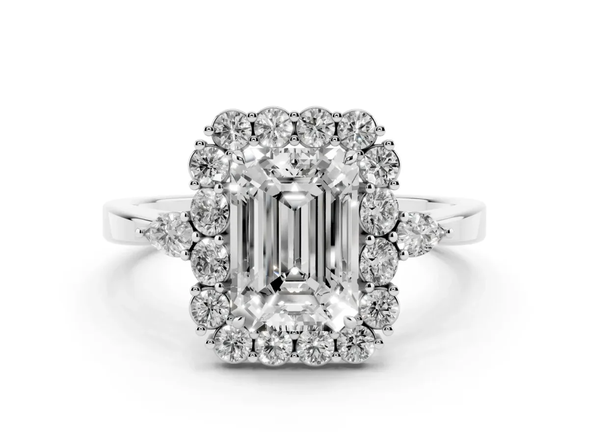 Emerald Cut Diamond Halo Ring with Pear Side Stones and Prong Setting Platinum