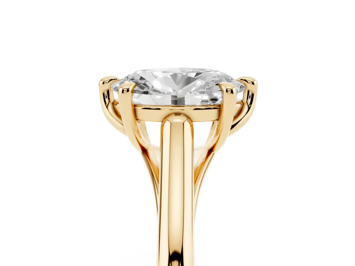 Oval Cut Solitaire Engagement Ring with Six-Prong Setting and Classic Band Yellow gold