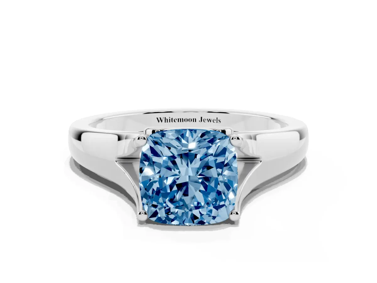 Fancy Blue Cushion Cut Solitaire Diamond Ring with Cathedral Band and Four-Prong Setting Silver