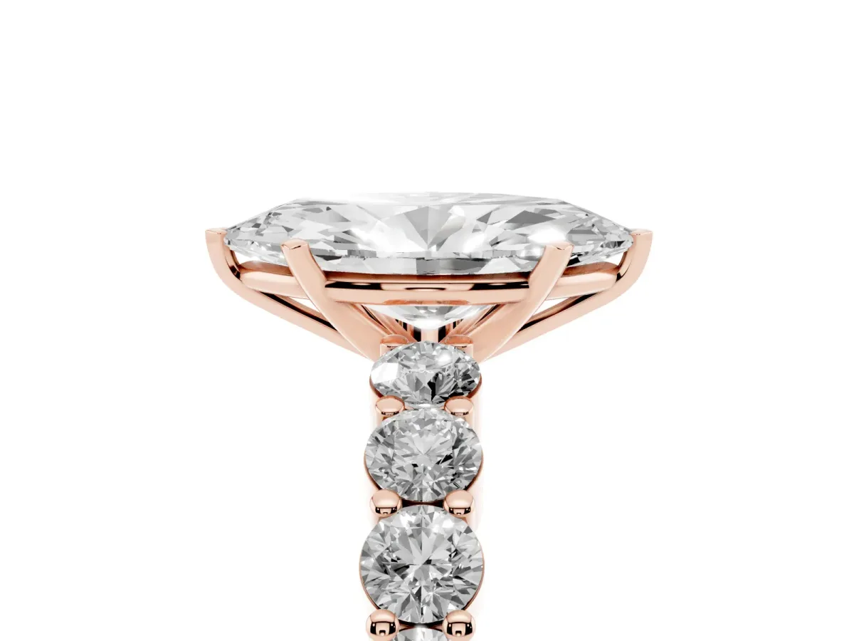 Marquise Cut Diamond Solitaire Ring with Shared Prong Round Side Stones Rose gold