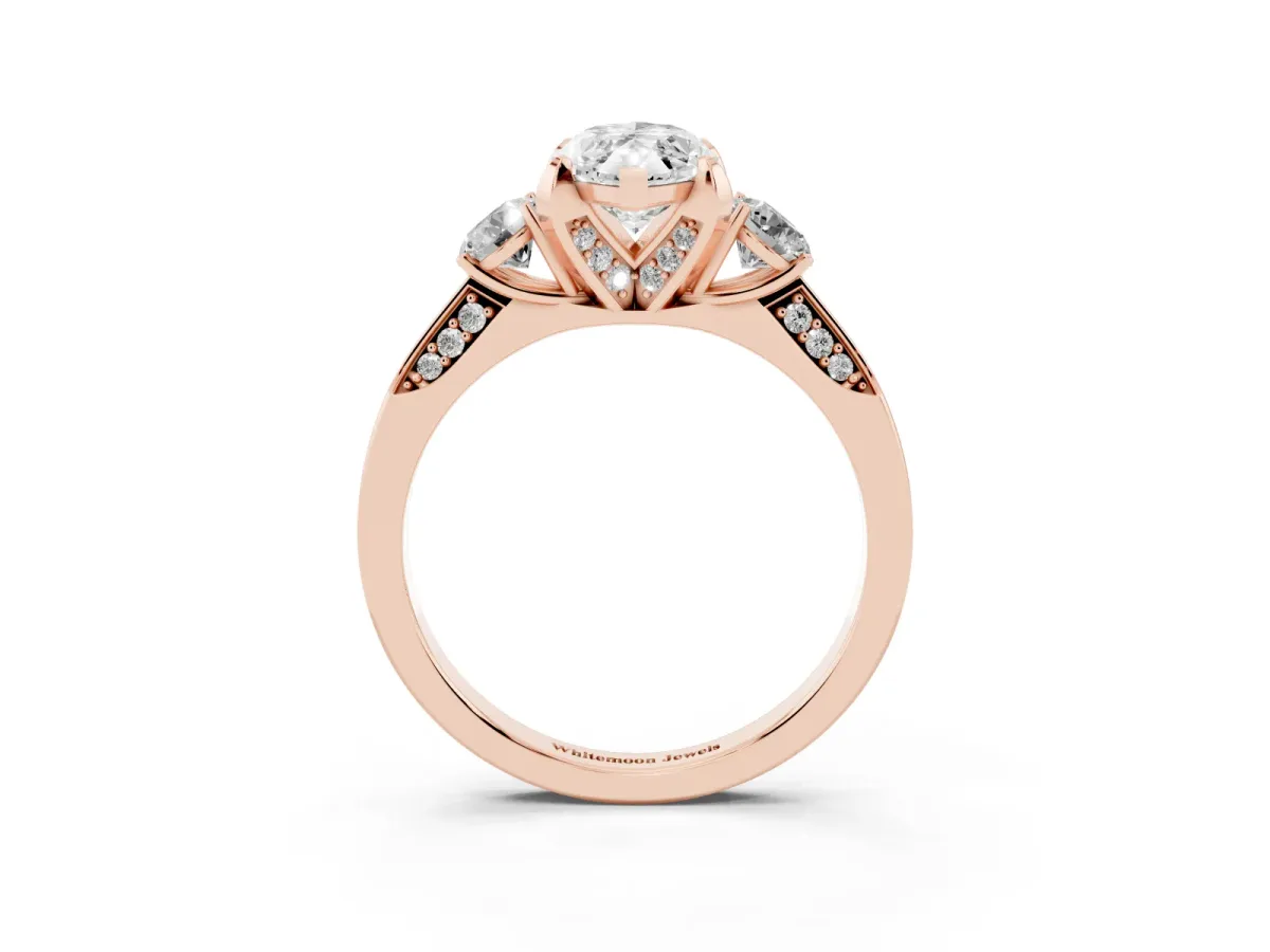 Marquise Cut Brilliant Three-Stone Diamond Ring with Pavé Band and Four-Prong Setting Rose gold