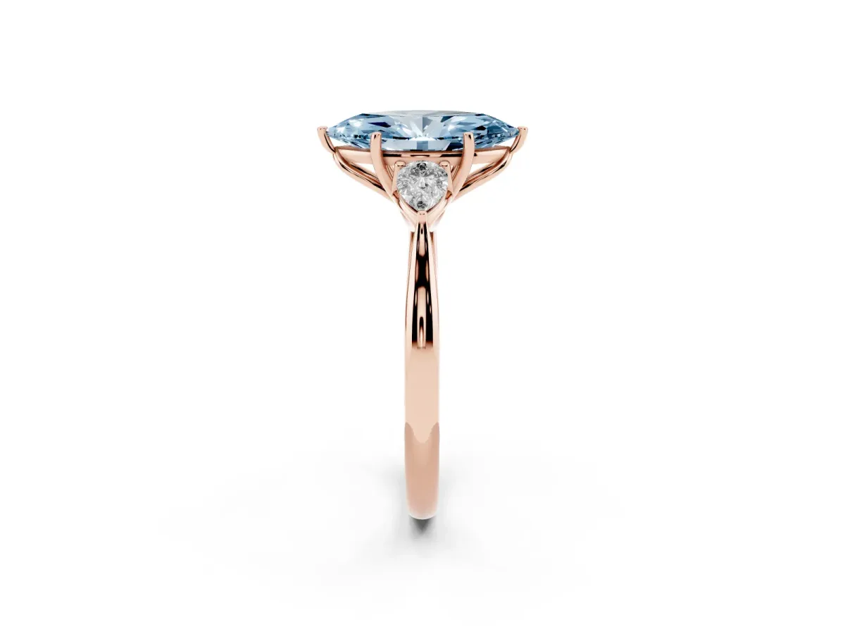 Fancy Blue Three-Stone Marquise Cut Brilliant Diamond Solitaire Ring with Tapered Band and Four-Prong Setting Rose gold