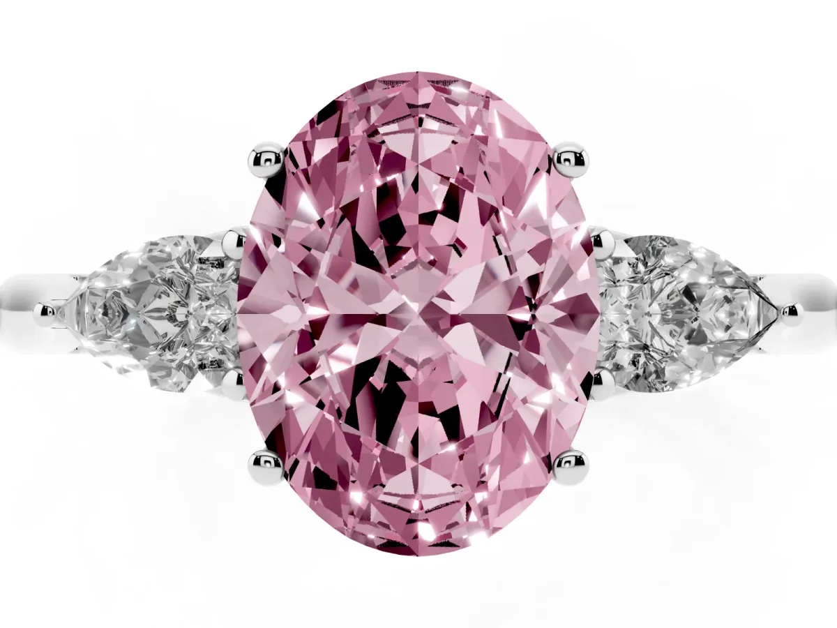 Fancy Pink Three-Stone Oval Cut Diamond Ring with Pear Side Stones in Four-Prong Setting Platinum