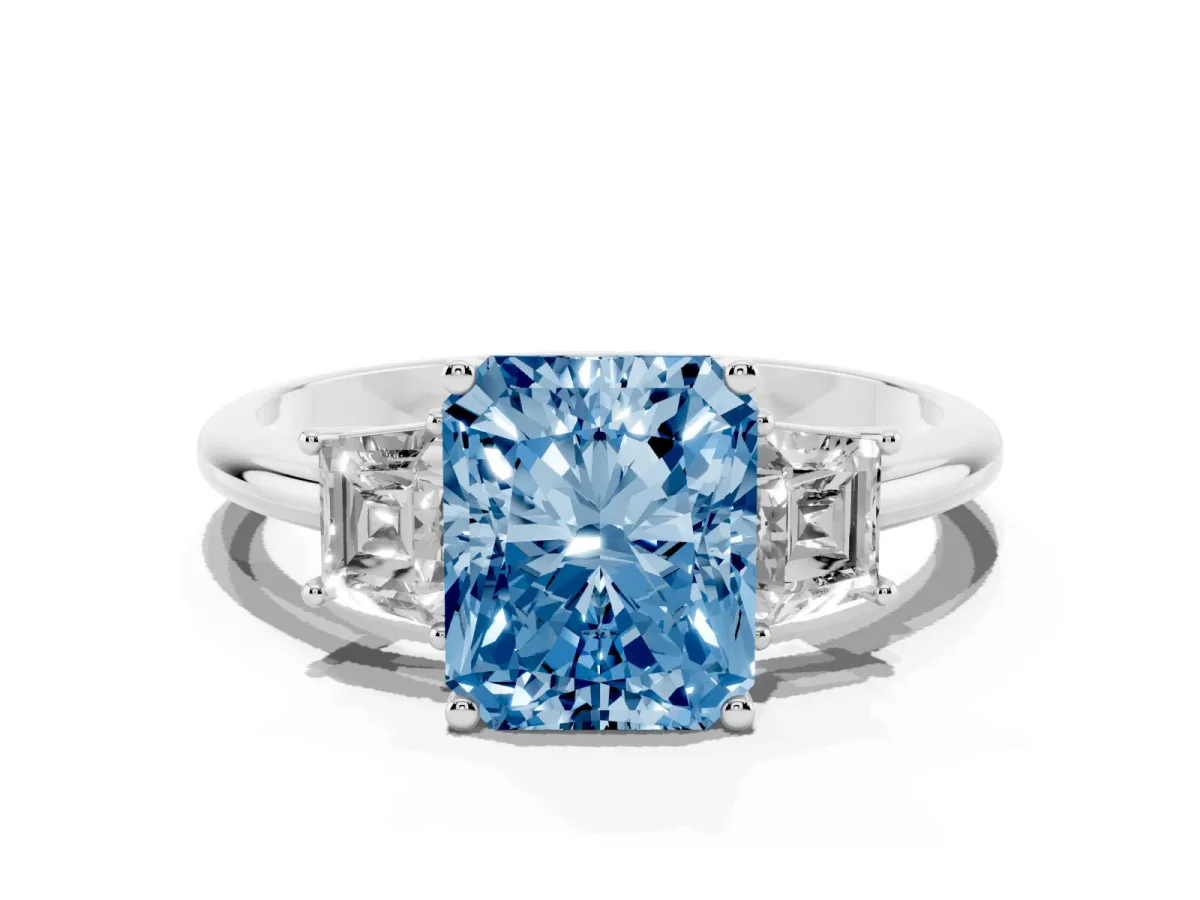 Fancy Blue Radiant Cut Diamond Three-Stone Ring with Trapezoid Side Stones and Prong Setting Silver