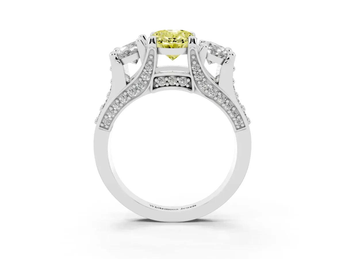 Fancy Yellow Oval Cut Diamond Three-Stone Ring with Channel Set Band and Four-Prong Setting Silver