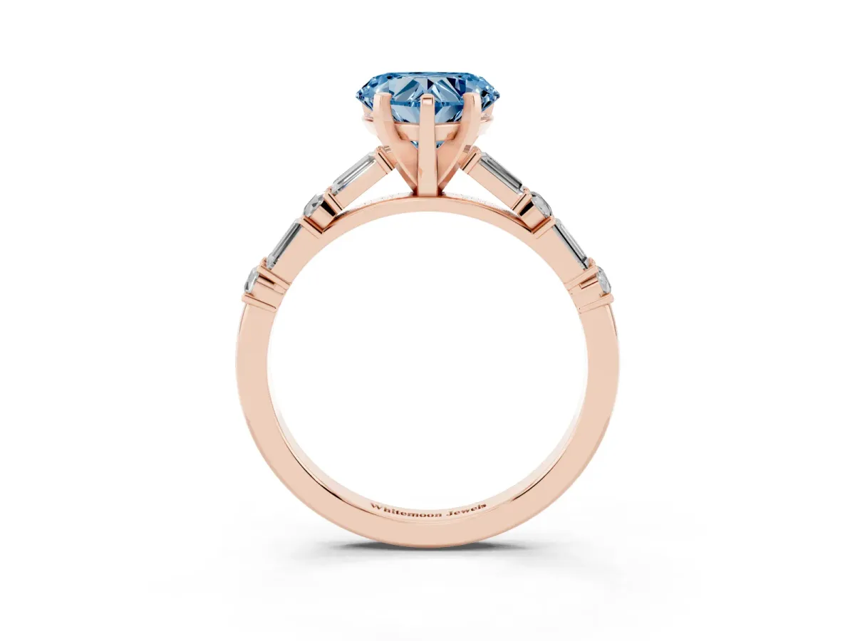 Fancy Blue Heart Cut Diamond Solitaire with Side Baguettes and Channel Set Band Rose gold