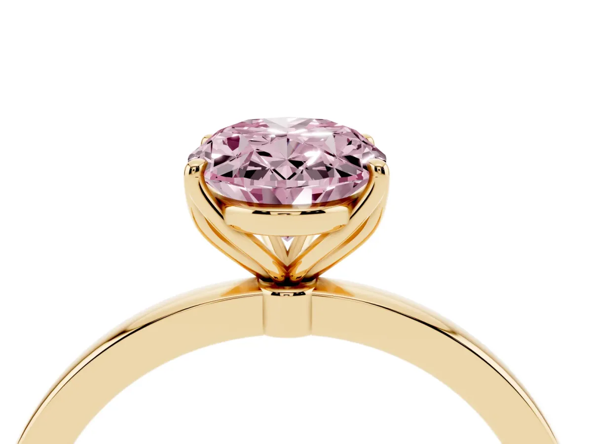 Fancy Pink Oval Cut Diamond Solitaire Ring with Thin Band and Prong Setting Yellow gold