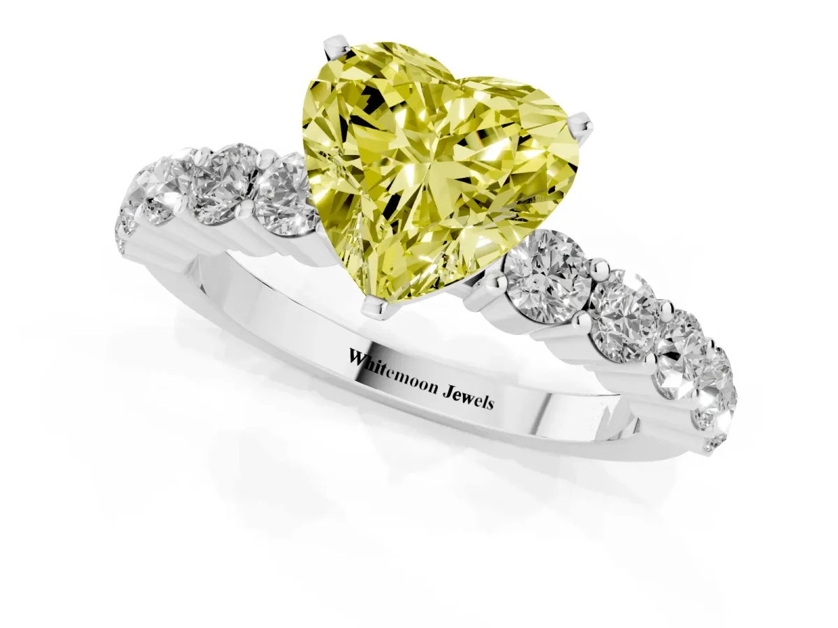 Fancy Yellow Heart Cut Diamond Solitaire Ring with Shared Prong Round Side Stones Silver
