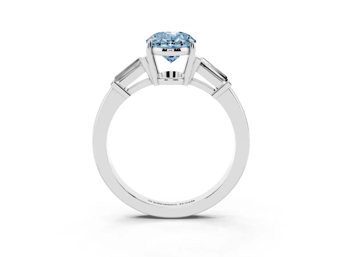 Fancy Blue Oval Cut Diamond Three-Stone Ring with Tapered Baguette Side Stones and Prong Setting Silver