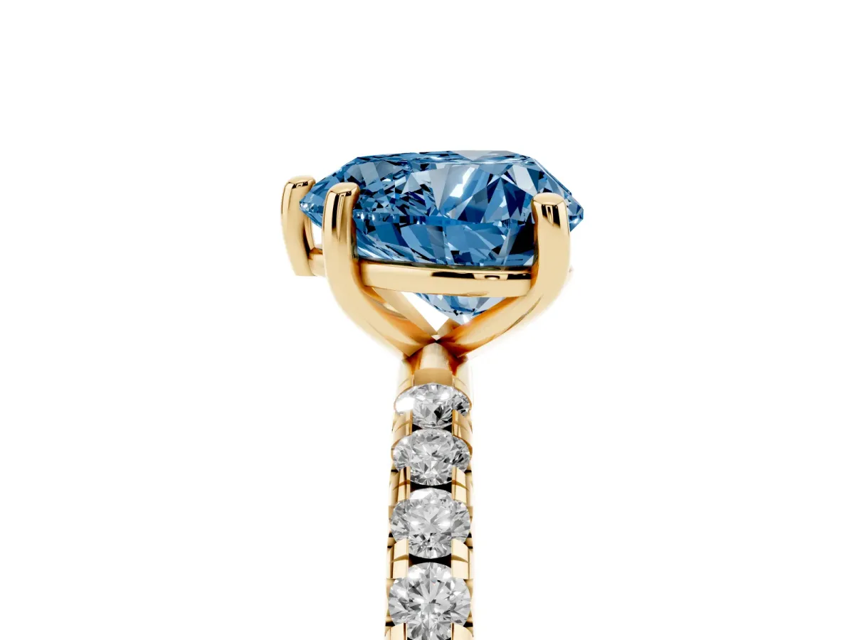 Fancy Blue Heart Cut Cut Diamond Solitaire Ring with Micro Pave Band and Four Prong Setting Yellow gold