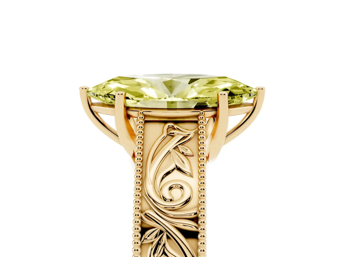 Fancy Yellow Marquise Cut Diamond Solitaire Ring with Engraved Band and Four-Prong Setting Yellow gold