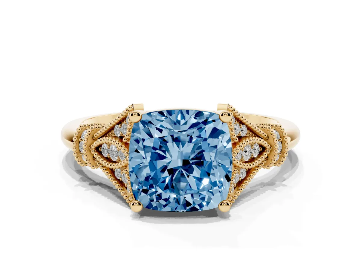 Fancy Blue Cushion Cut Diamond Solitaire Ring with Floral Filigree and Pave Accents Yellow gold