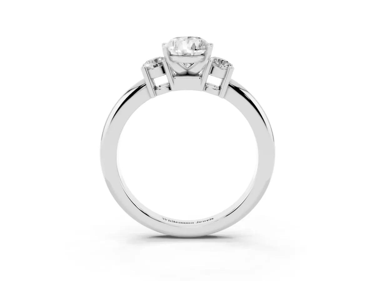 Three-Stone Pear Cut Cut Diamond Solitaire with Prong Setting and Classic Band Platinum