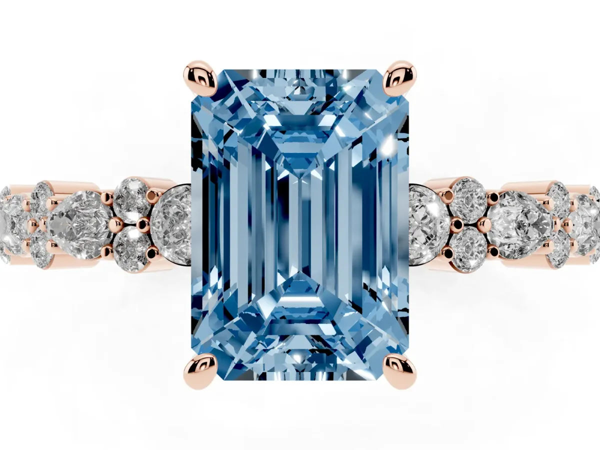 Fancy Blue Emerald Cut Diamond Side Stone Solitaire Ring with Round and Four-Prong Setting Rose gold