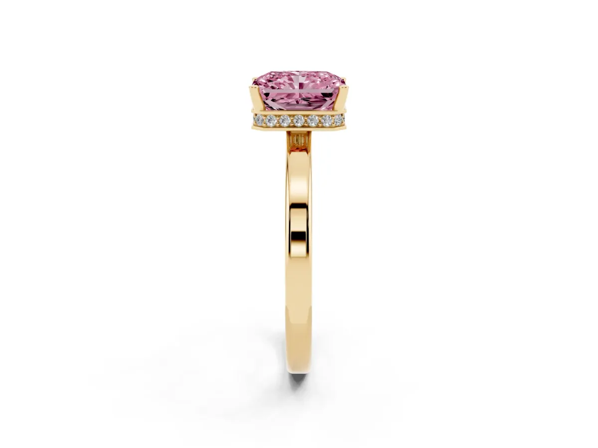 Fancy Pink Radiant Cut Cut Solitaire Engagement Ring with Four-Prong Setting on a Classic Band Yellow gold