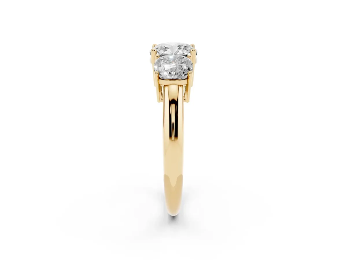Three-Stone Cushion Cut Cut Diamond Engagement Ring with Prong Setting on a White Gold Band Yellow gold