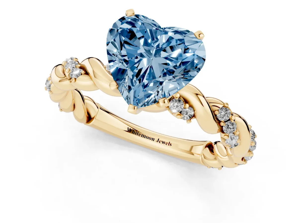 Fancy Blue Heart Cut Diamond Solitaire Ring with Twisted Band and Pavé Accents Yellow gold