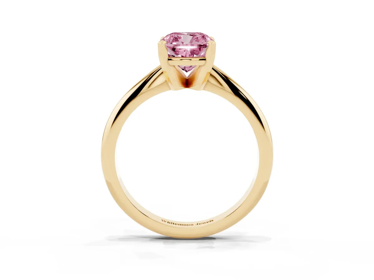 Fancy Pink Cushion Cut Cut Solitaire Ring with Four-Prong Setting on a Classic Band Yellow gold