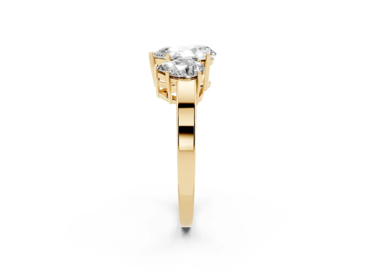 Three-Stone Pear Cut Cut Diamond Engagement Ring with Flat Band and Four-Prong Setting Yellow gold
