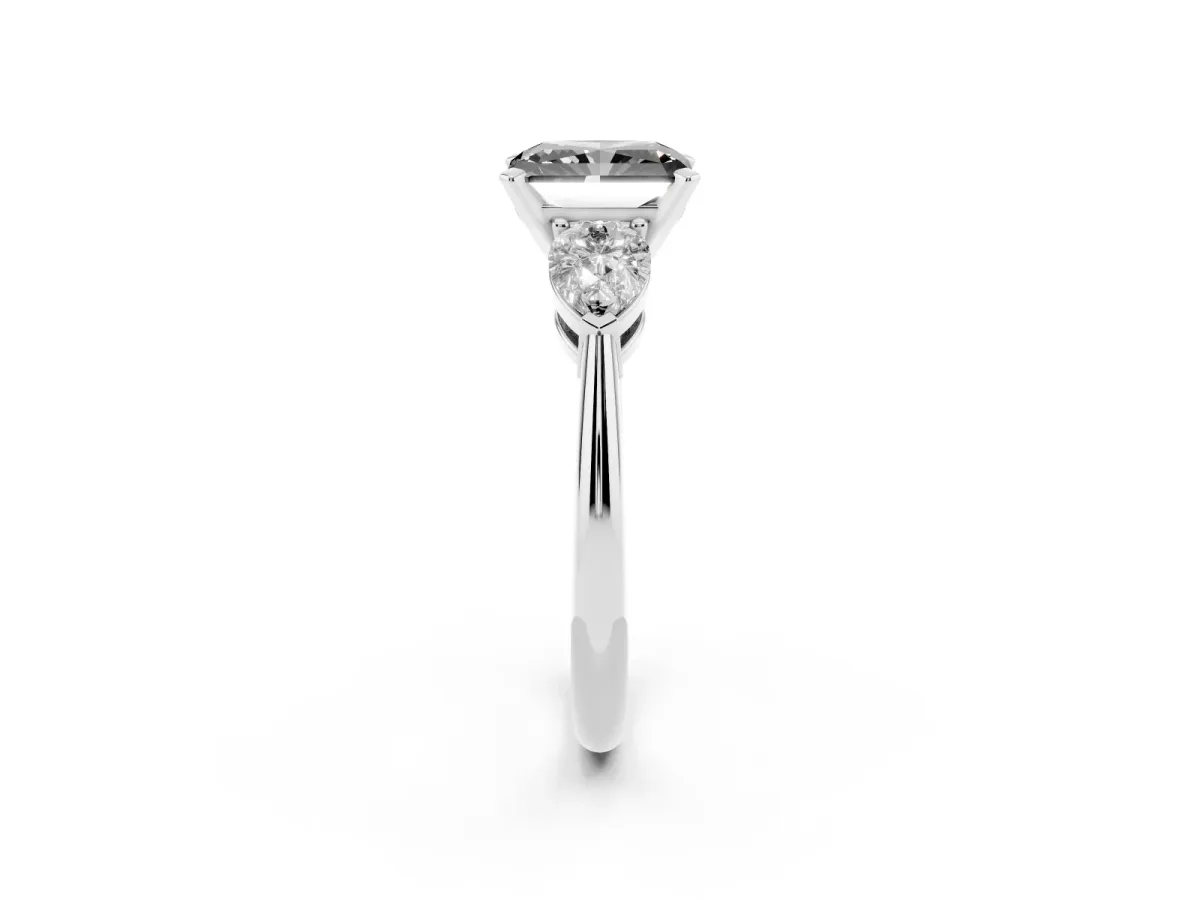Fancy Black Three-Stone Radiant Cut Diamond Ring with Pear Side Stones and Four-Prong Setting Silver