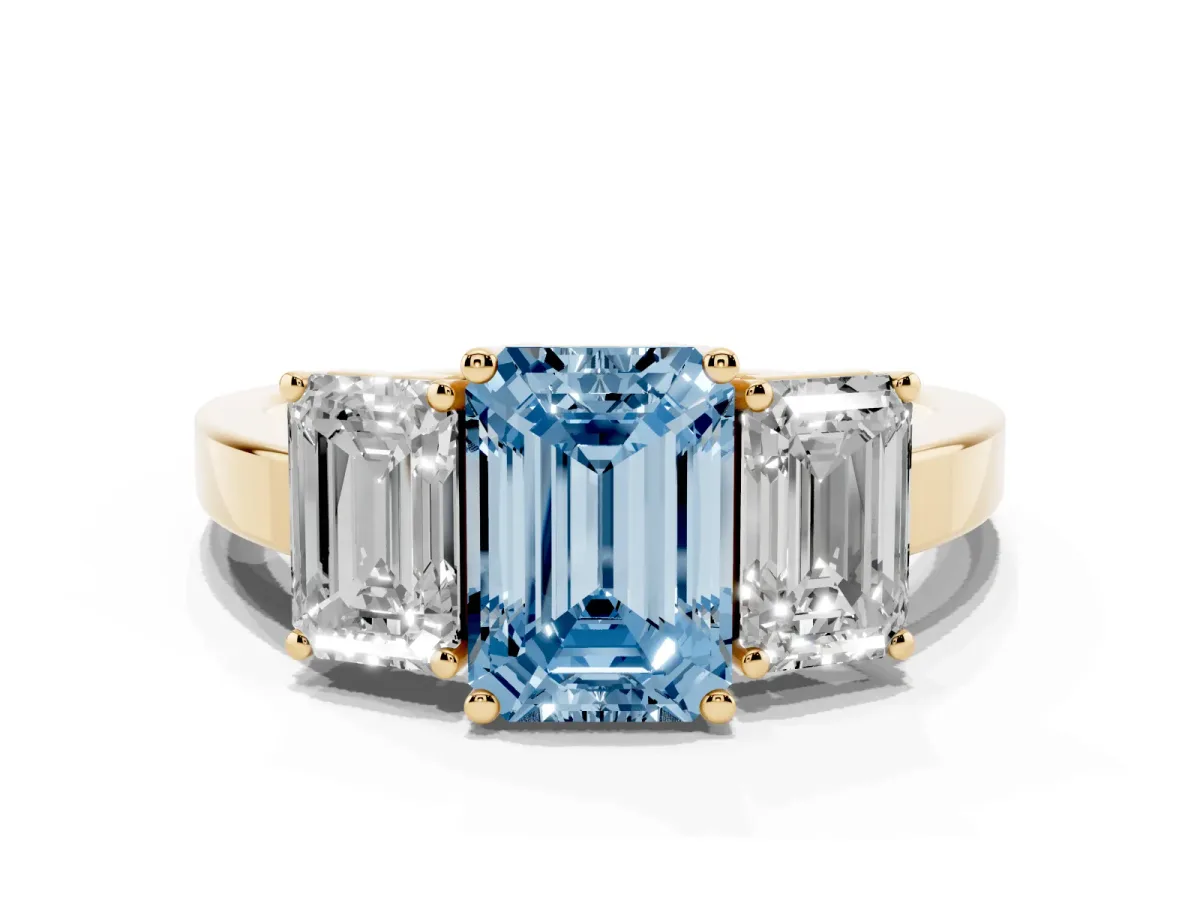 Fancy Blue Three-Stone Emerald Cut Cut Diamond Engagement Ring with Flat Band and Four-Prong Setting Yellow gold