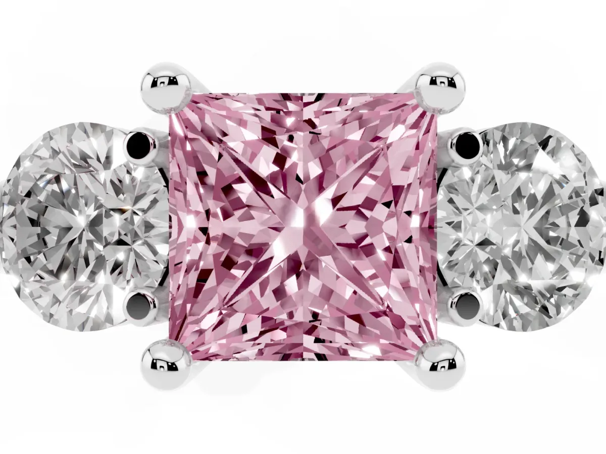 Fancy Pink Three-Stone Princess Cut Brilliant Cut Solitaire Ring with Prong Setting on a Classic Band Silver