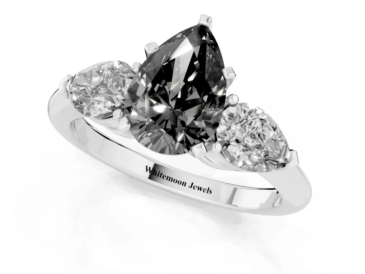Fancy Black Three-Stone Pear Cut Diamond Ring with Pear Side Stones and Four-Prong Setting Platinum